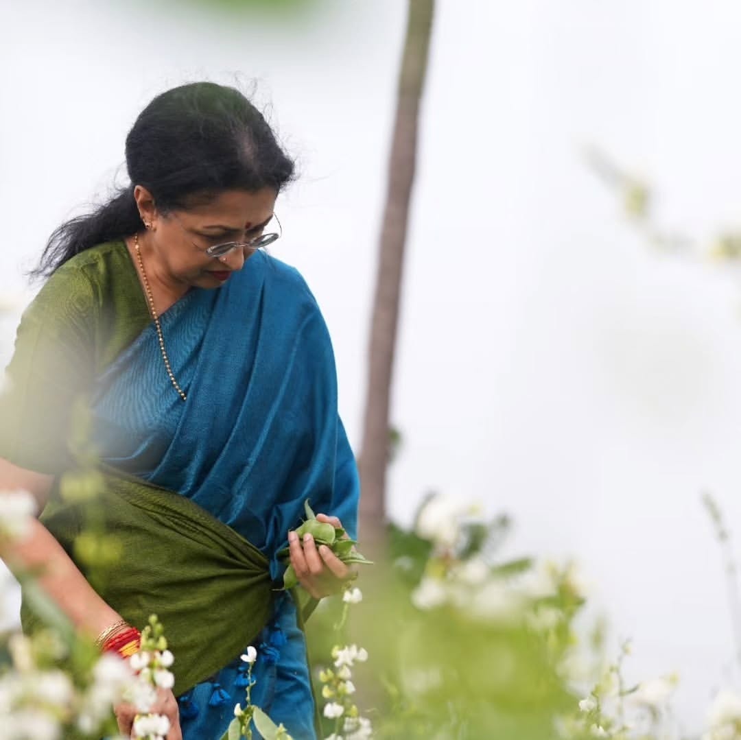 Gautami harvesting organic crops in agricultural field